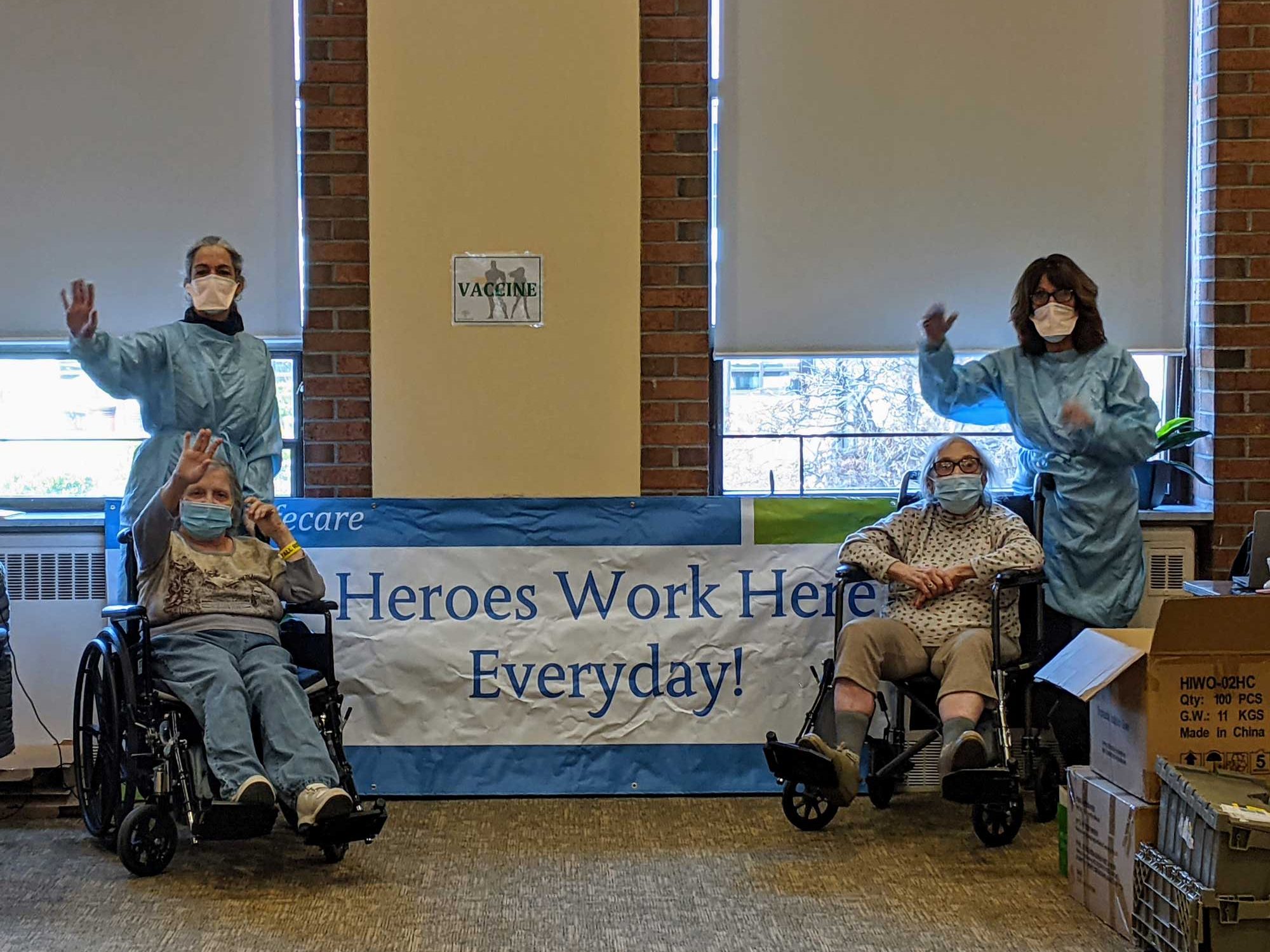 Hero banner with two residents and two staff members of JGS Lifecare