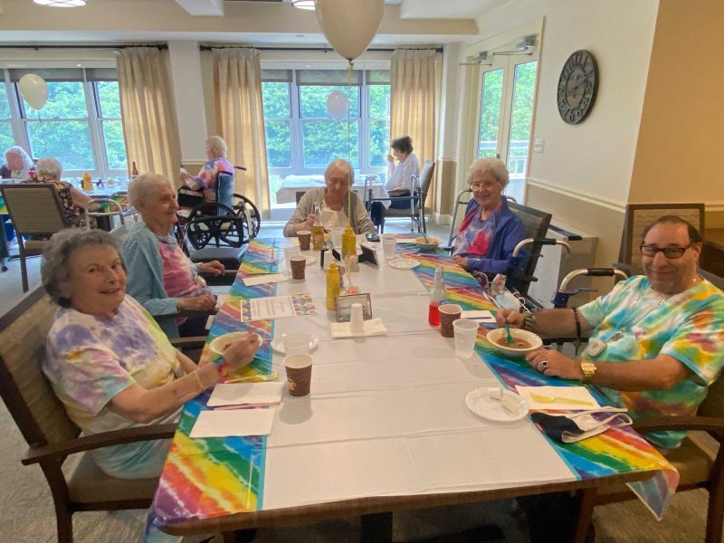 Ruth's House residents tie dye tshirts.