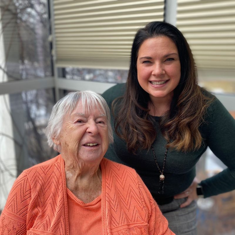 Christina with a resident