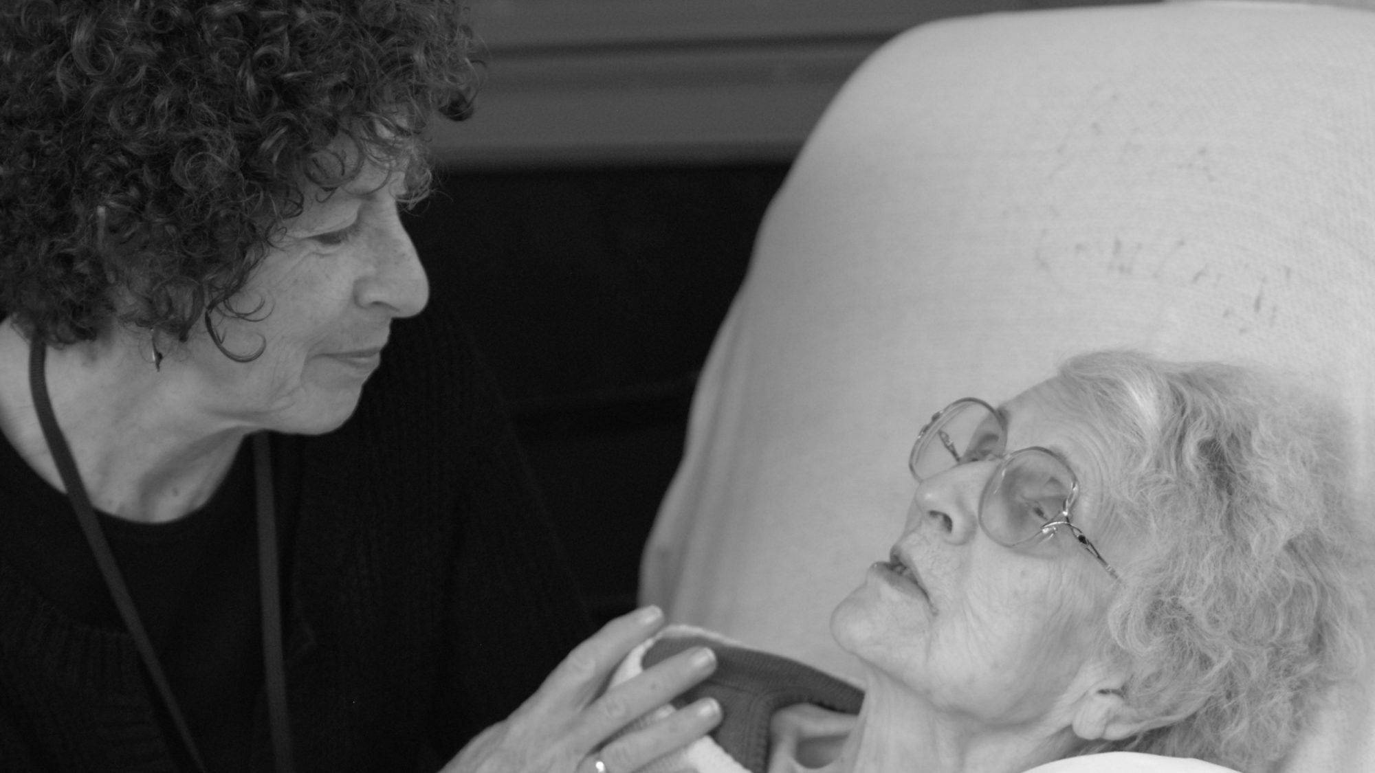 Spectrum Hospice Aide attending to a patient.