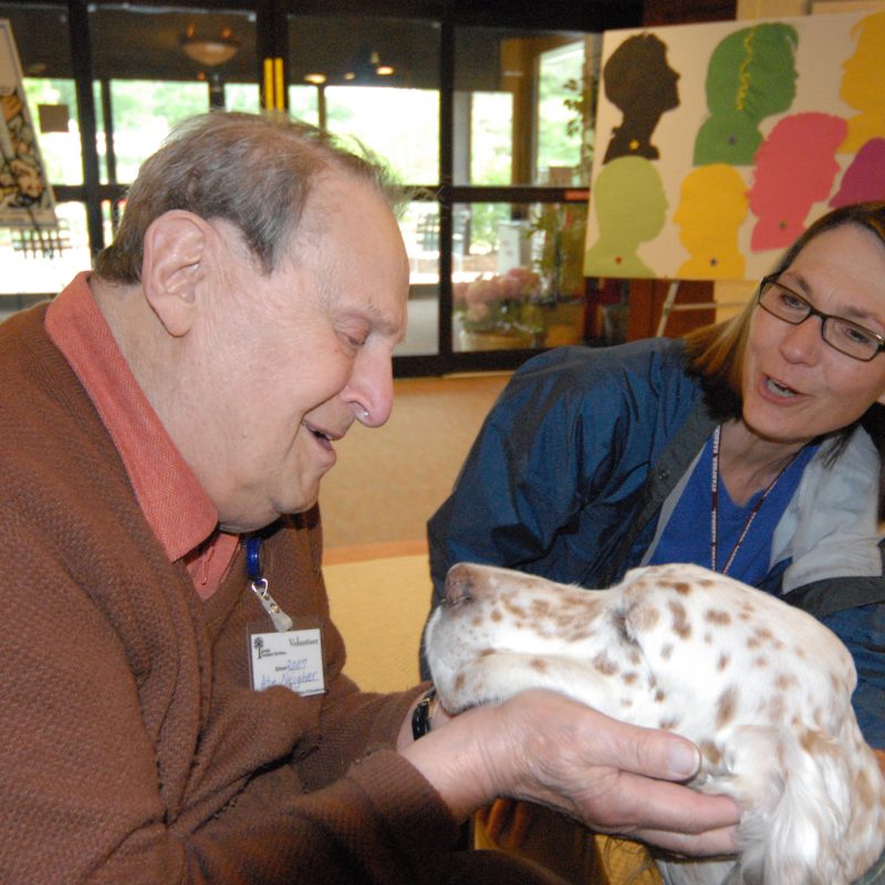 Volunteer and a dog